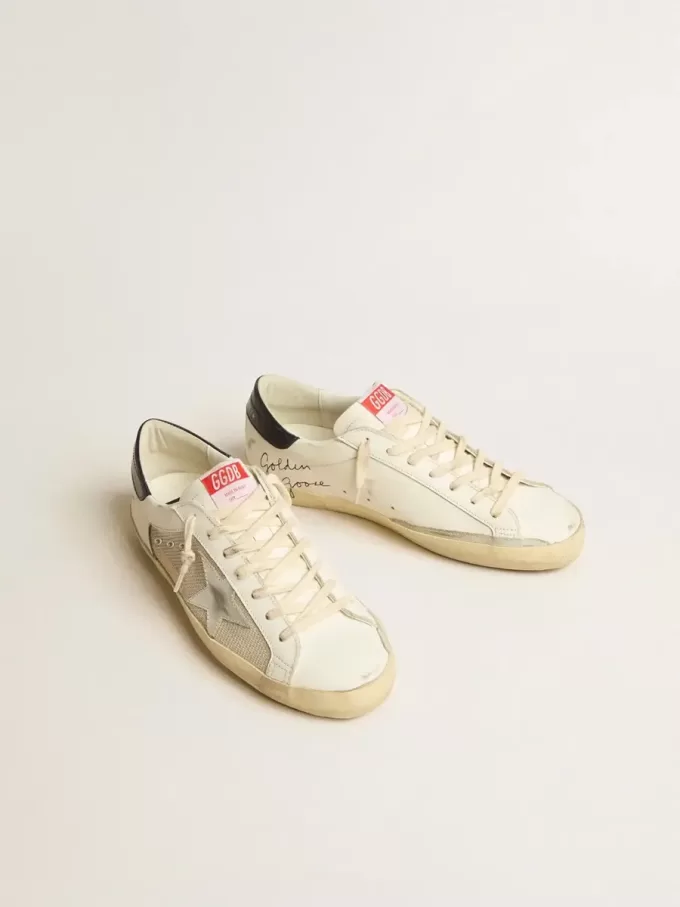 Super-Star LTD para hombre en malla y piel con estrella plateada y lengüeta azul en el talón