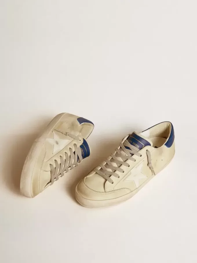 Super-Star LTD para hombre en nubuck con estrella de cuero blanco y lengüeta azul en el talón