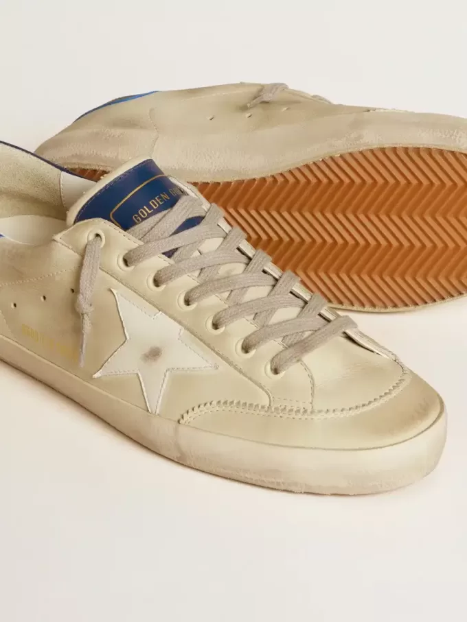 Super-Star LTD para hombre en nubuck con estrella de cuero blanco y lengüeta azul en el talón
