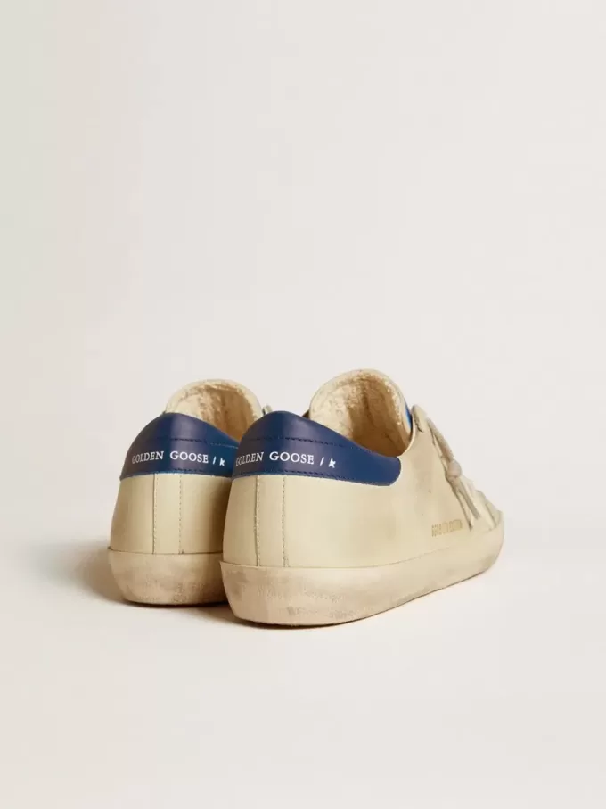 Super-Star LTD para hombre en nubuck con estrella de cuero blanco y lengüeta azul en el talón