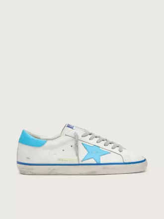 Super-Star LTD para hombre en piel blanca con estrella y lengüeta del talón en piel azul claro Super-Star LTD para hombre en piel blanca con estrella y lengüeta del talón en piel azul claro
