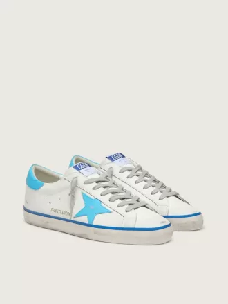 Super-Star LTD para hombre en piel blanca con estrella y lengüeta del talón en piel azul claro Super-Star LTD para hombre en piel blanca con estrella y lengüeta del talón en piel azul claro
