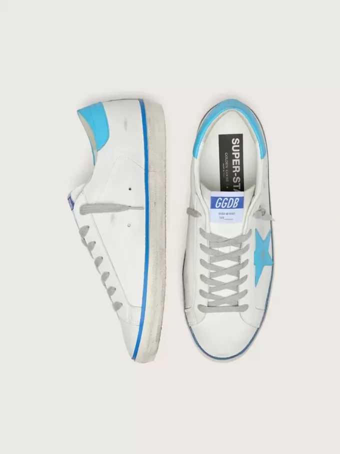 Super-Star LTD para hombre en piel blanca con estrella y lengüeta del talón en piel azul claro