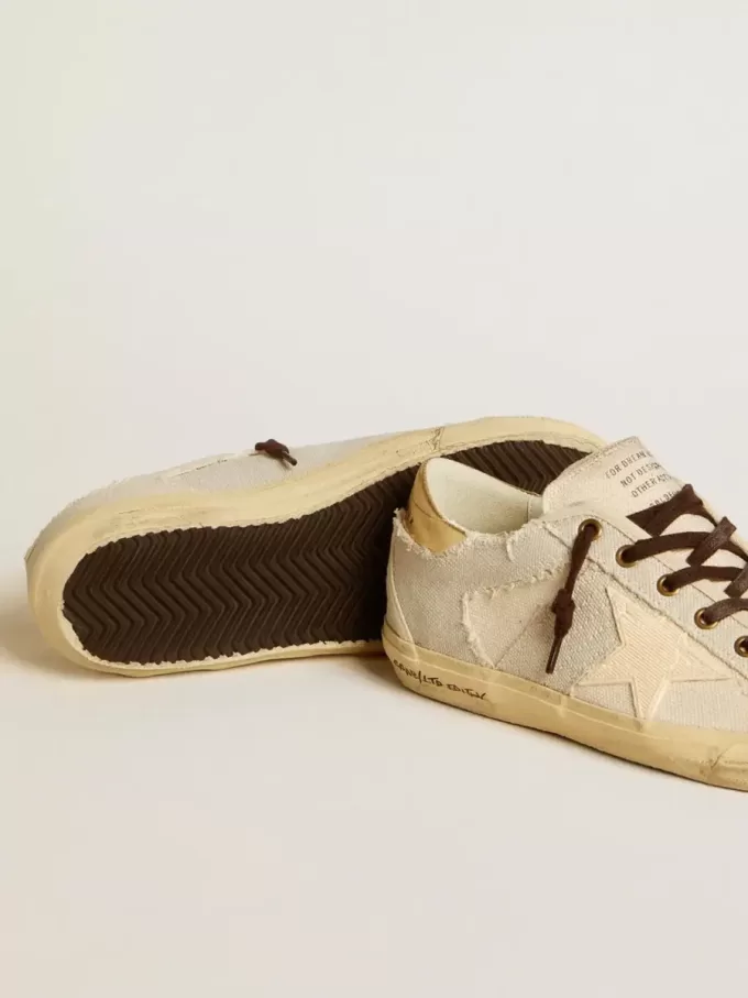 Super-Star LTD para mujer en lona con estrella de TPU y lengüeta de cuero en el talón Super-Star LTD para mujer en lona con estrella de TPU y lengüeta de cuero en el talón