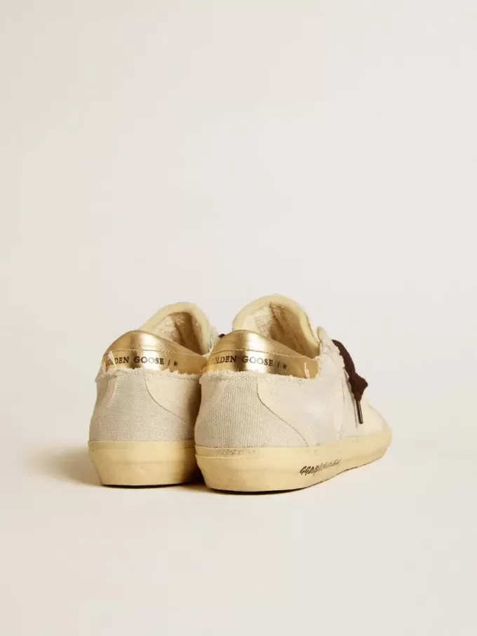 Super-Star LTD para mujer en lona con estrella de TPU y lengüeta de cuero en el talón Super-Star LTD para mujer en lona con estrella de TPU y lengüeta de cuero en el talón