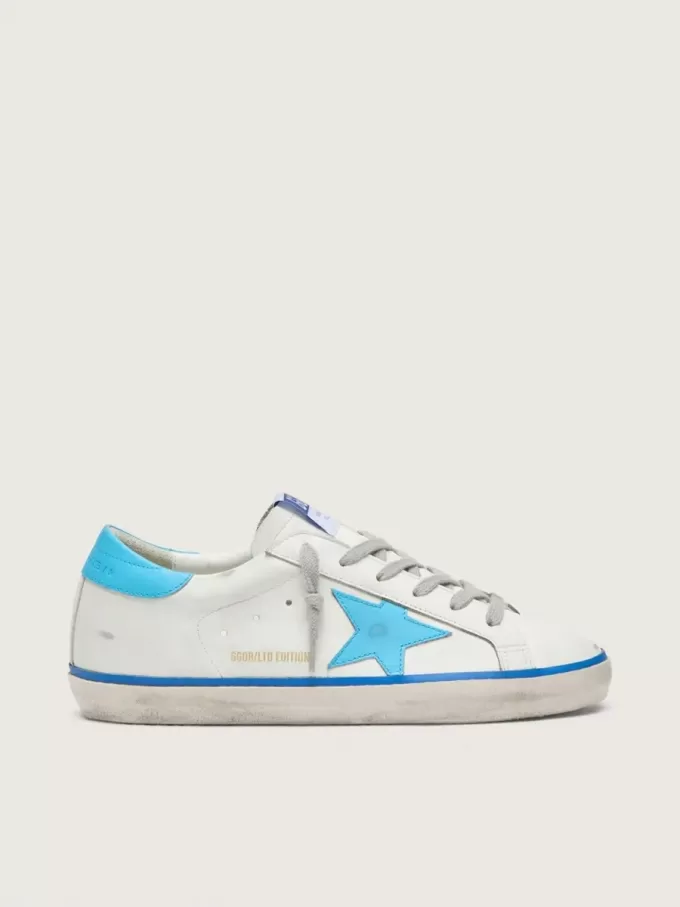 Super-Star LTD para mujer en piel blanca con estrella y lengüeta del talón en piel azul claro Super-Star LTD para mujer en piel blanca con estrella y lengüeta del talón en piel azul claro