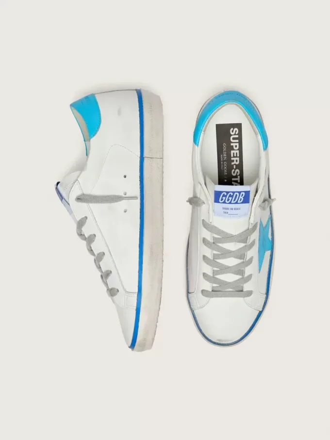 Super-Star LTD para mujer en piel blanca con estrella y lengüeta del talón en piel azul claro Super-Star LTD para mujer en piel blanca con estrella y lengüeta del talón en piel azul claro