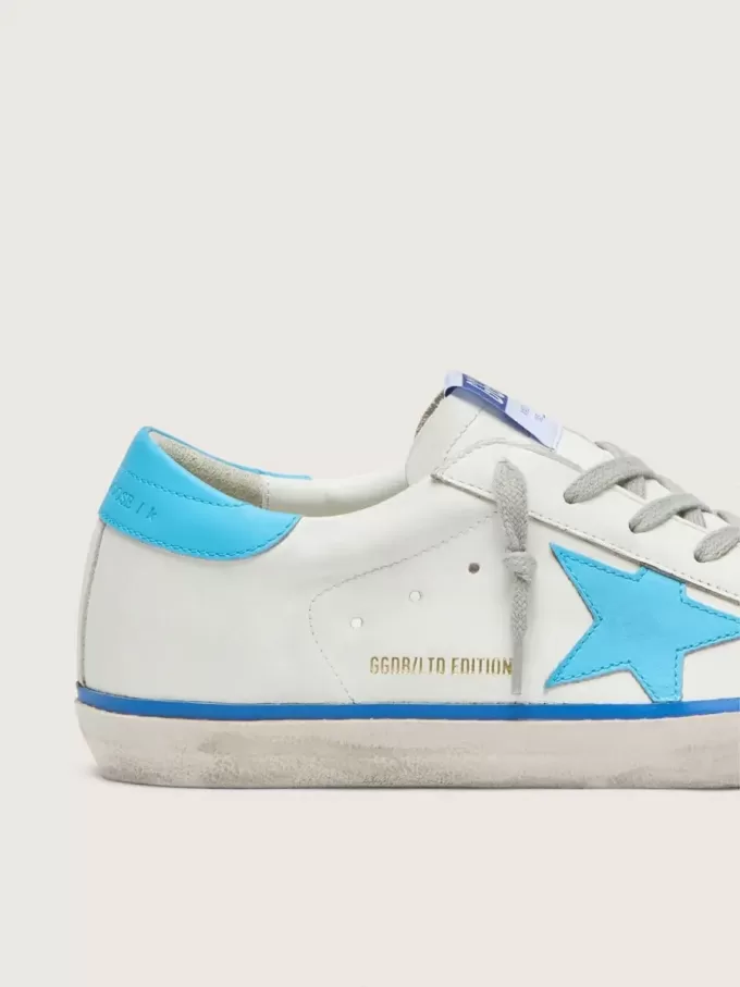 Super-Star LTD para mujer en piel blanca con estrella y lengüeta del talón en piel azul claro Super-Star LTD para mujer en piel blanca con estrella y lengüeta del talón en piel azul claro