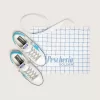 Super-Star LTD para mujer en piel blanca con estrella y lengüeta del talón en piel azul claro Super-Star LTD para mujer en piel blanca con estrella y lengüeta del talón en piel azul claro