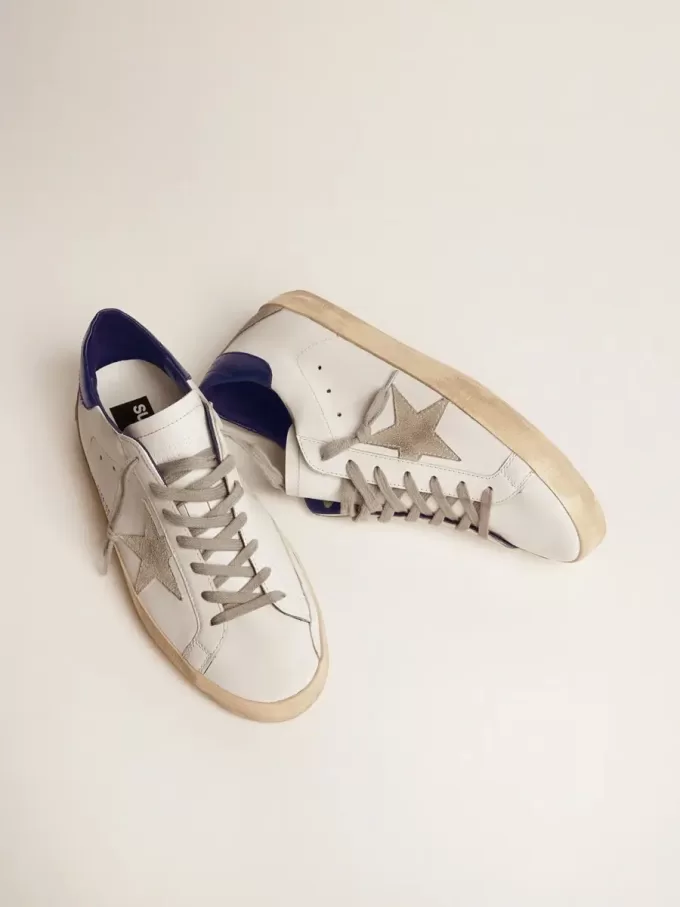 Super-Star para hombre con estrella de ante y lengüeta azul en el talón Super-Star para hombre con estrella de ante y lengüeta azul en el talón
