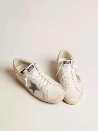 Super-Star para hombre con estrella de ante y lengüeta del talón de piel con estampado de serpiente platino Super-Star para hombre con estrella de ante y lengüeta del talón de piel con estampado de serpiente platino