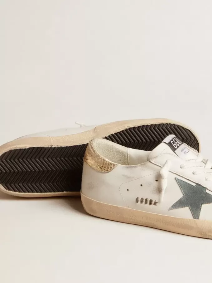 Super-Star para hombre con estrella de ante y lengüeta del talón de piel con estampado de serpiente platino Super-Star para hombre con estrella de ante y lengüeta del talón de piel con estampado de serpiente platino