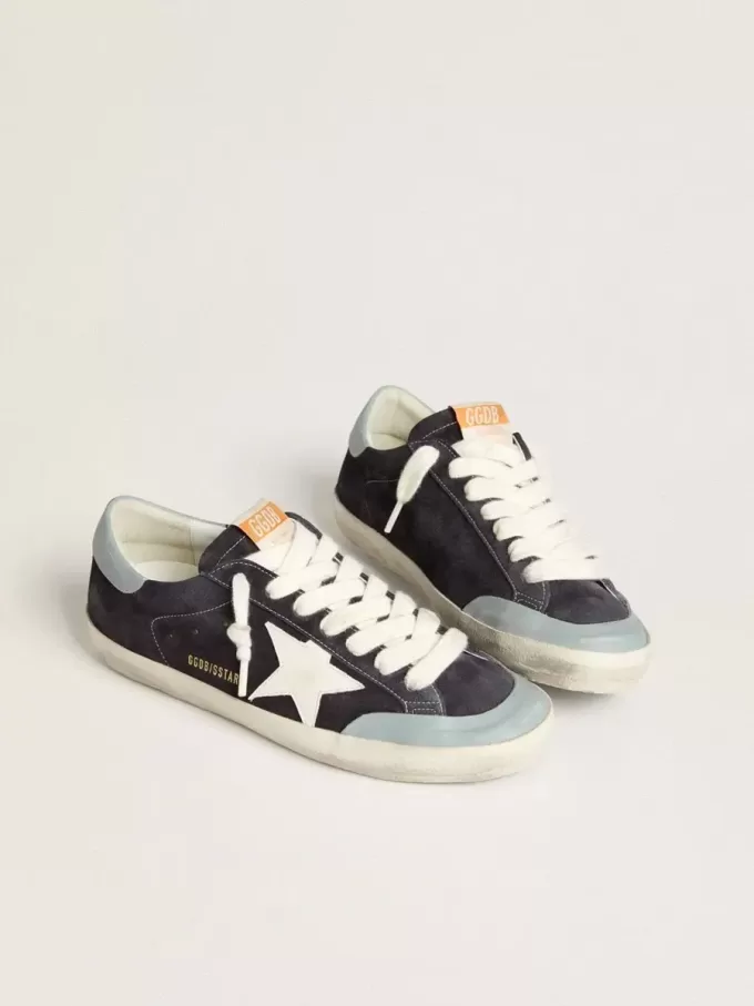 Super-Star para hombre en ante azul medianoche con estrella de cuero blanco y lengüeta del talón de cuero azul claro