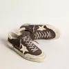 Super-Star para hombre en ante gris con estrella y lengüeta en el talón en napa cruda.