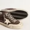 Super-Star para hombre en ante gris con estrella y lengüeta en el talón en napa cruda.
