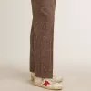 Super-Star para hombre en napa con estrella roja y lengüeta del talón en piel color crema.