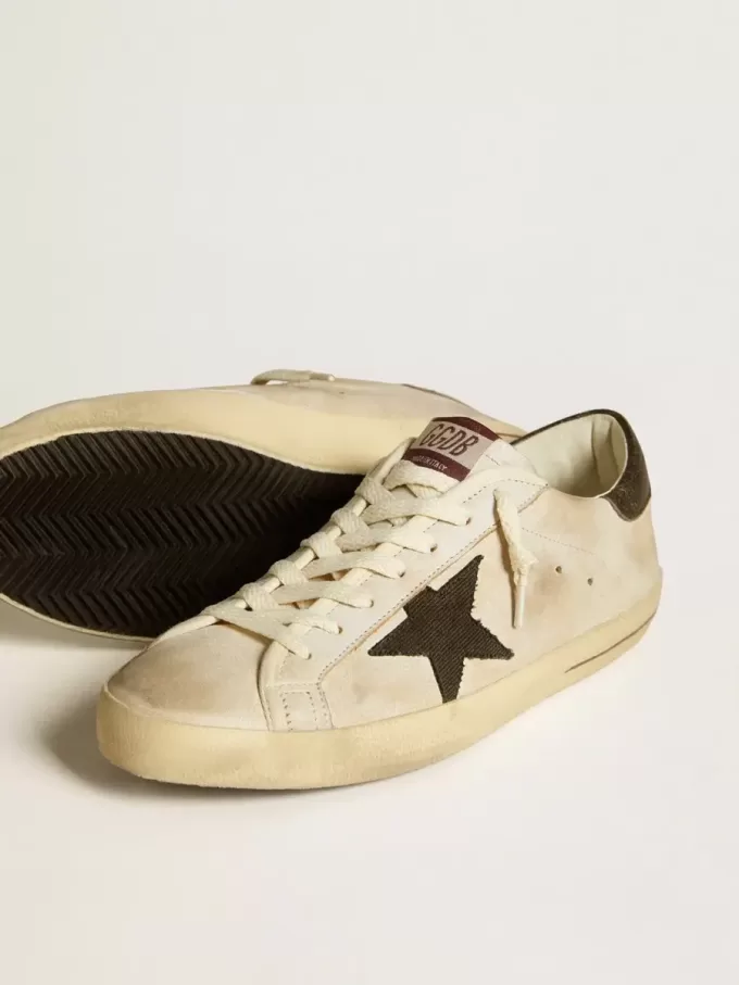 Super-Star para hombre en piel con estrella de denim negro y lengüeta del talón en piel negra Super-Star para hombre en piel con estrella de denim negro y lengüeta del talón en piel negra
