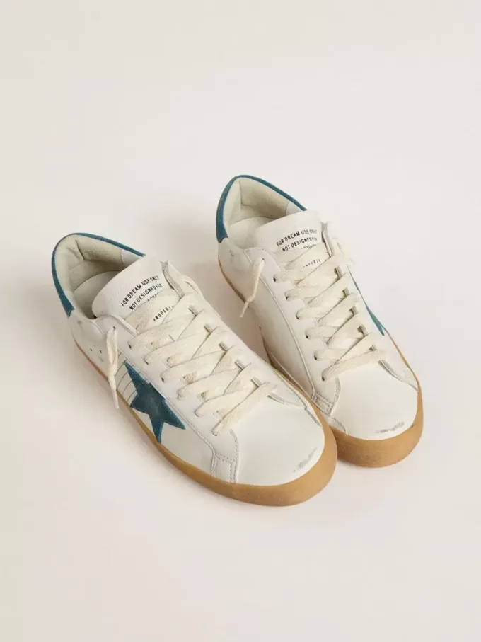 Super-Star para hombre en piel con estrella y lengüeta del talón en ante azul petróleo Super-Star para hombre en piel con estrella y lengüeta del talón en ante azul petróleo