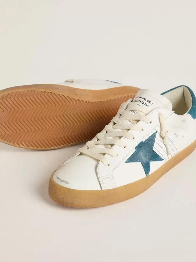 Super-Star para hombre en piel con estrella y lengüeta del talón en ante azul petróleo Super-Star para hombre en piel con estrella y lengüeta del talón en ante azul petróleo