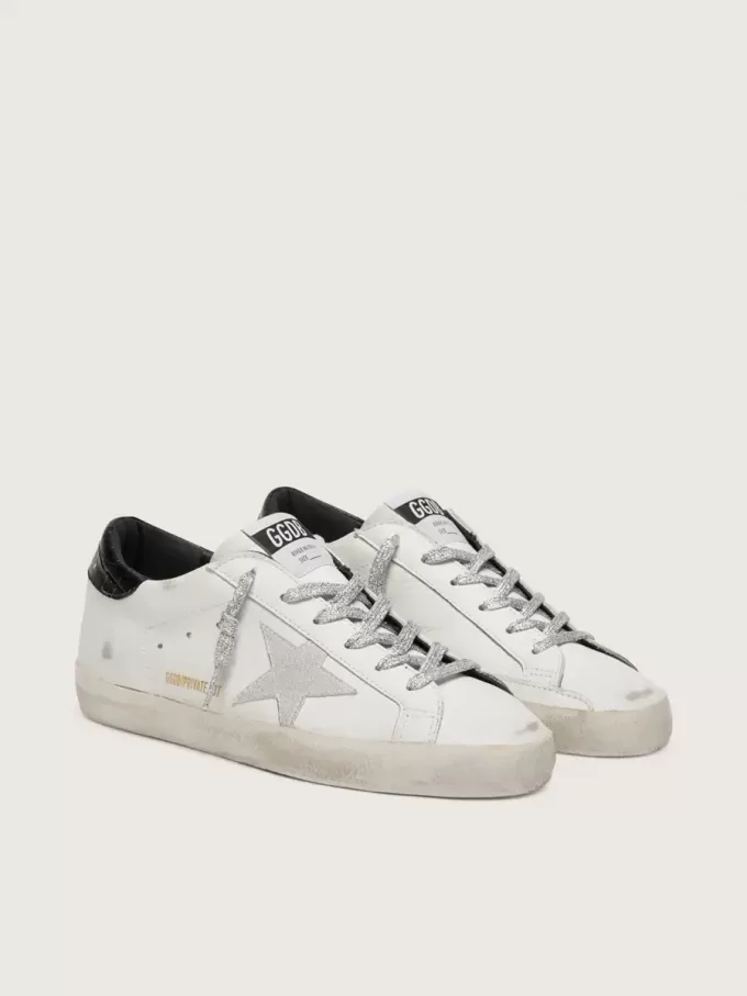 Super-Star para mujer con estrella de ante blanco y lengüeta del talón de piel negra con estampado de cocodrilo Super-Star para mujer con estrella de ante blanco y lengüeta del talón de piel negra con estampado de cocodrilo
