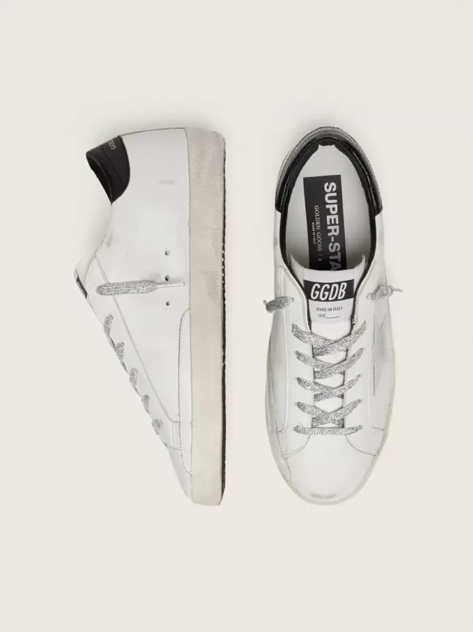 Super-Star para mujer con estrella de ante blanco y lengüeta del talón de piel negra con estampado de cocodrilo Super-Star para mujer con estrella de ante blanco y lengüeta del talón de piel negra con estampado de cocodrilo