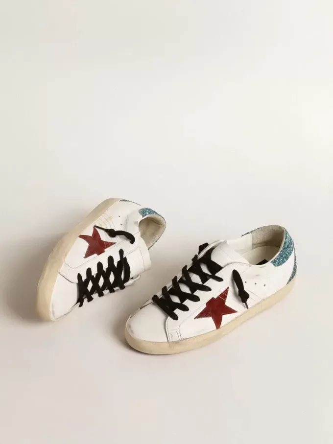 Super-Star para mujer con estrella de ante burdeos y lengüeta del talón con purpurina azul claro Super-Star para mujer con estrella de ante burdeos y lengüeta del talón con purpurina azul claro