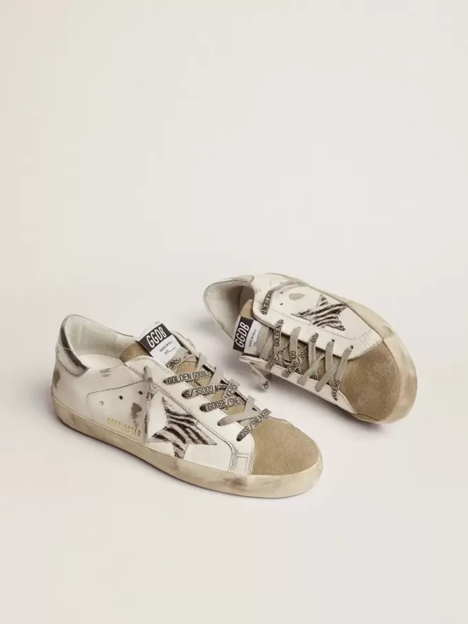 Super-Star para mujer con estrella de piel de potro con estampado de cebra Super-Star para mujer con estrella de piel de potro con estampado de cebra