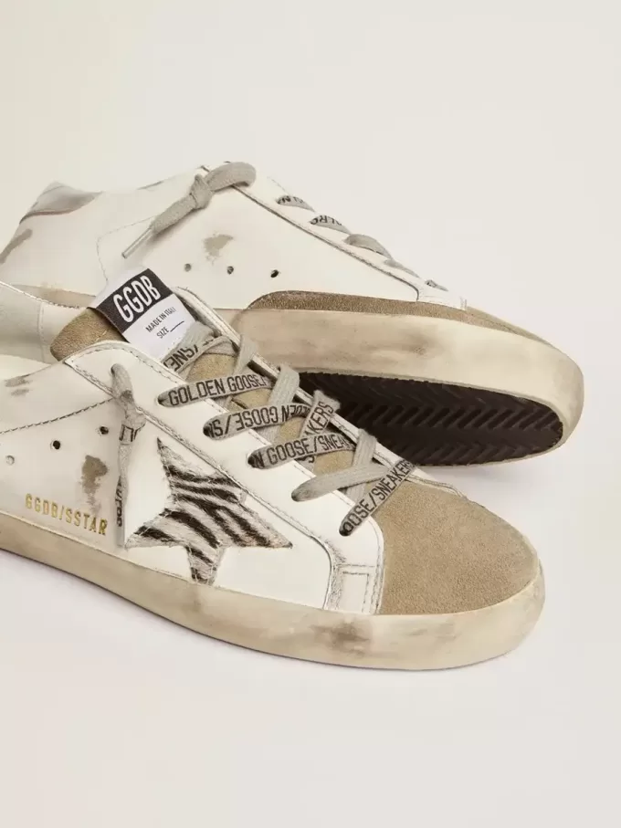Super-Star para mujer con estrella de piel de potro con estampado de cebra Super-Star para mujer con estrella de piel de potro con estampado de cebra