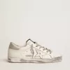 Zapatillas Super-Star para mujer con lengüeta plateada en el talón y letras metálicas con tachuelas Zapatillas Super-Star para mujer con lengüeta plateada en el talón y letras metálicas con tachuelas