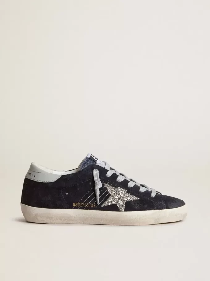 Super-Star para mujer en ante azul, estrella plateada brillante y lengüeta de cuero en el talón Super-Star para mujer en ante azul, estrella plateada brillante y lengüeta de cuero en el talón