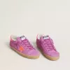 Super-Star para mujer en ante fucsia con estrella y lengüeta en el talón de cuero laminado naranja fluorescente Super-Star para mujer en ante fucsia con estrella y lengüeta en el talón de cuero laminado naranja fluorescente