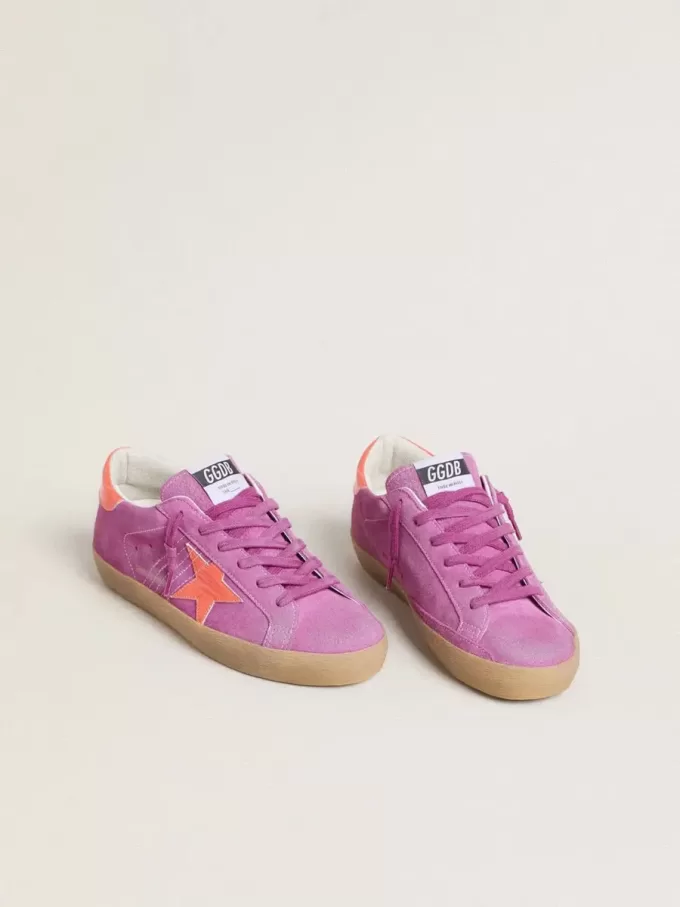 Super-Star para mujer en ante fucsia con estrella y lengüeta en el talón de cuero laminado naranja fluorescente Super-Star para mujer en ante fucsia con estrella y lengüeta en el talón de cuero laminado naranja fluorescente