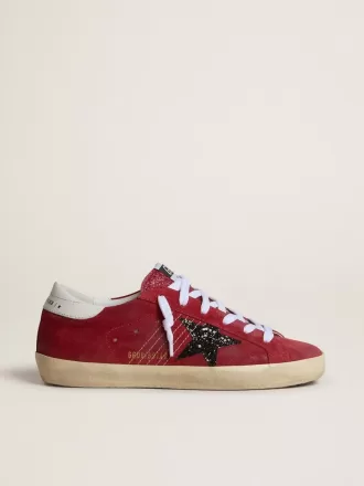 Super-Star para mujer en ante rojo con estrella brillante y lengüeta blanca en el talón
