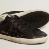 Super-Star para mujer en napa negra y purpurina con estrella de cuero negro brillante Super-Star para mujer en napa negra y purpurina con estrella de cuero negro brillante