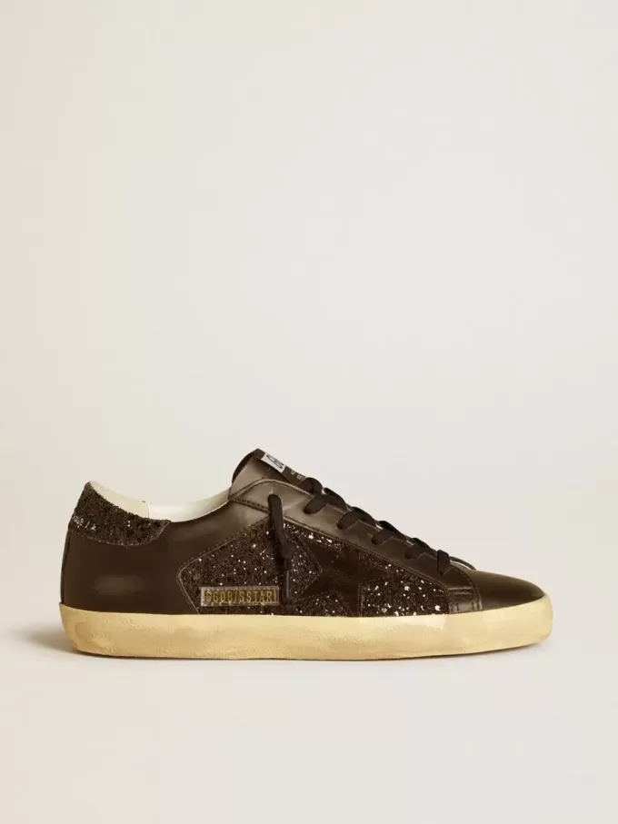 Super-Star para mujer en negro brillante con estrella de ante negro e inserciones de cuero Super-Star para mujer en negro brillante con estrella de ante negro e inserciones de cuero