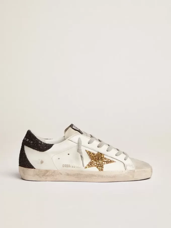 Super-Star para mujer en piel napa con estrella dorada brillante y lengüeta negra brillante en el talón Super-Star para mujer en piel napa con estrella dorada brillante y lengüeta negra brillante en el talón