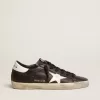 Super-Star para mujer en piel negra con estrella y lengüeta en el talón en piel blanca Super-Star para mujer en piel negra con estrella y lengüeta en el talón en piel blanca