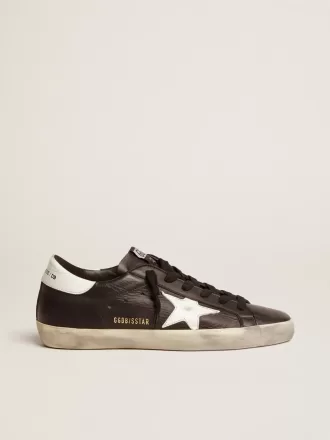 Super-Star para mujer en piel negra con estrella y lengüeta en el talón en piel blanca Super-Star para mujer en piel negra con estrella y lengüeta en el talón en piel blanca