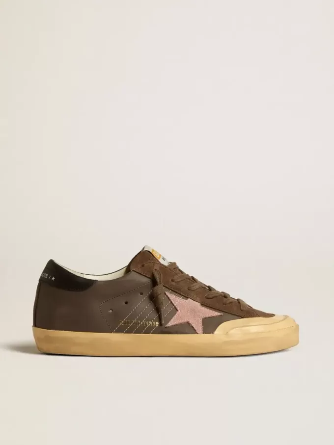 Super-Star Penstar LTD para mujer en piel marrón con estrella de ante rosa Super-Star Penstar LTD para mujer en piel marrón con estrella de ante rosa
