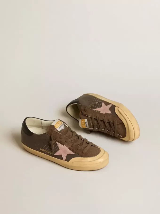 Super-Star Penstar LTD para mujer en piel marrón con estrella de ante rosa Super-Star Penstar LTD para mujer en piel marrón con estrella de ante rosa