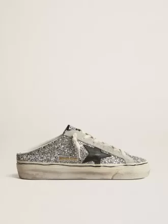Super-Star Sabot para mujer en plata brillante con estrella de cuero negro