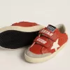 Teen Old School en napa naranja con estrella blanca y lengüeta del talón en piel color crema Teen Old School en napa naranja con estrella blanca y lengüeta del talón en piel color crema