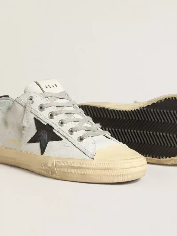 V-Star en piel con estrella y lengüeta en el talón de piel con estampado de cocodrilo negro V-Star en piel con estrella y lengüeta en el talón de piel con estampado de cocodrilo negro