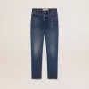 Vaqueros acampanados cropped para mujer con lavado medio Vaqueros acampanados cropped para mujer con lavado medio