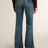 Vaqueros bootcut para mujer con lavado vintage y detalles metálicos Vaqueros bootcut para mujer con lavado vintage y detalles metálicos