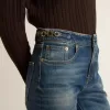 Vaqueros bootcut para mujer con lavado vintage y detalles metálicos Vaqueros bootcut para mujer con lavado vintage y detalles metálicos