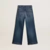 Vaqueros bootcut para niña con lavado medio y bordados Vaqueros bootcut para niña con lavado medio y bordados