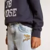 Vaqueros de denim claro para niño