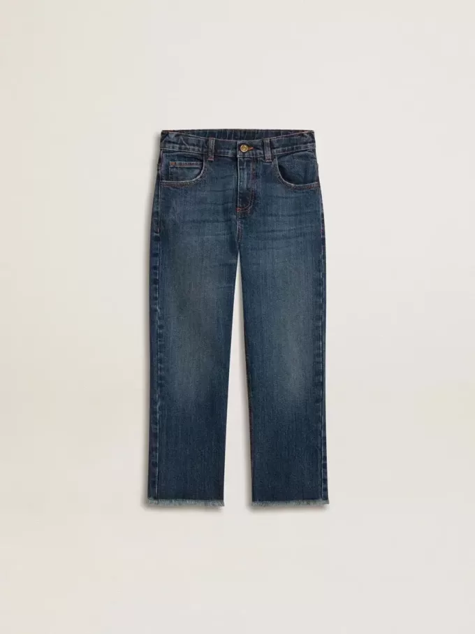 Vaqueros de denim para niño con borde sin rematar y bordados