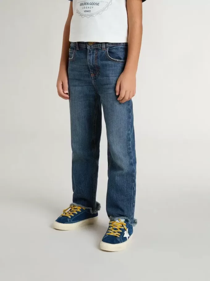 Vaqueros de denim para niño con borde sin rematar y bordados